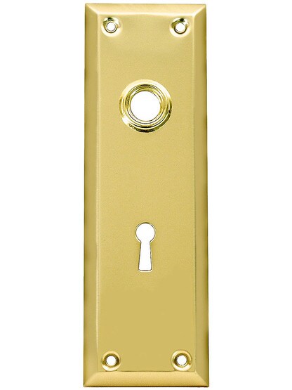 Stamped Brass New York Door Plate With Keyhole in Polished Brass.